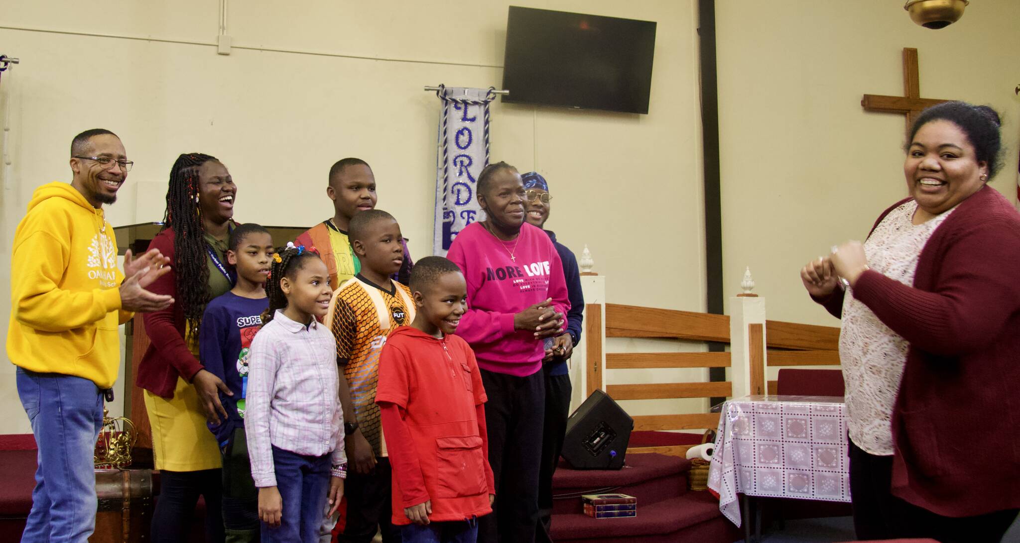 Nicole Rice, at right, leads a rehearsal for the annual Martin Luther King Jr. event at the House of Prayer. (Photo by Rachel Rosen/Whidbey News-Times)
