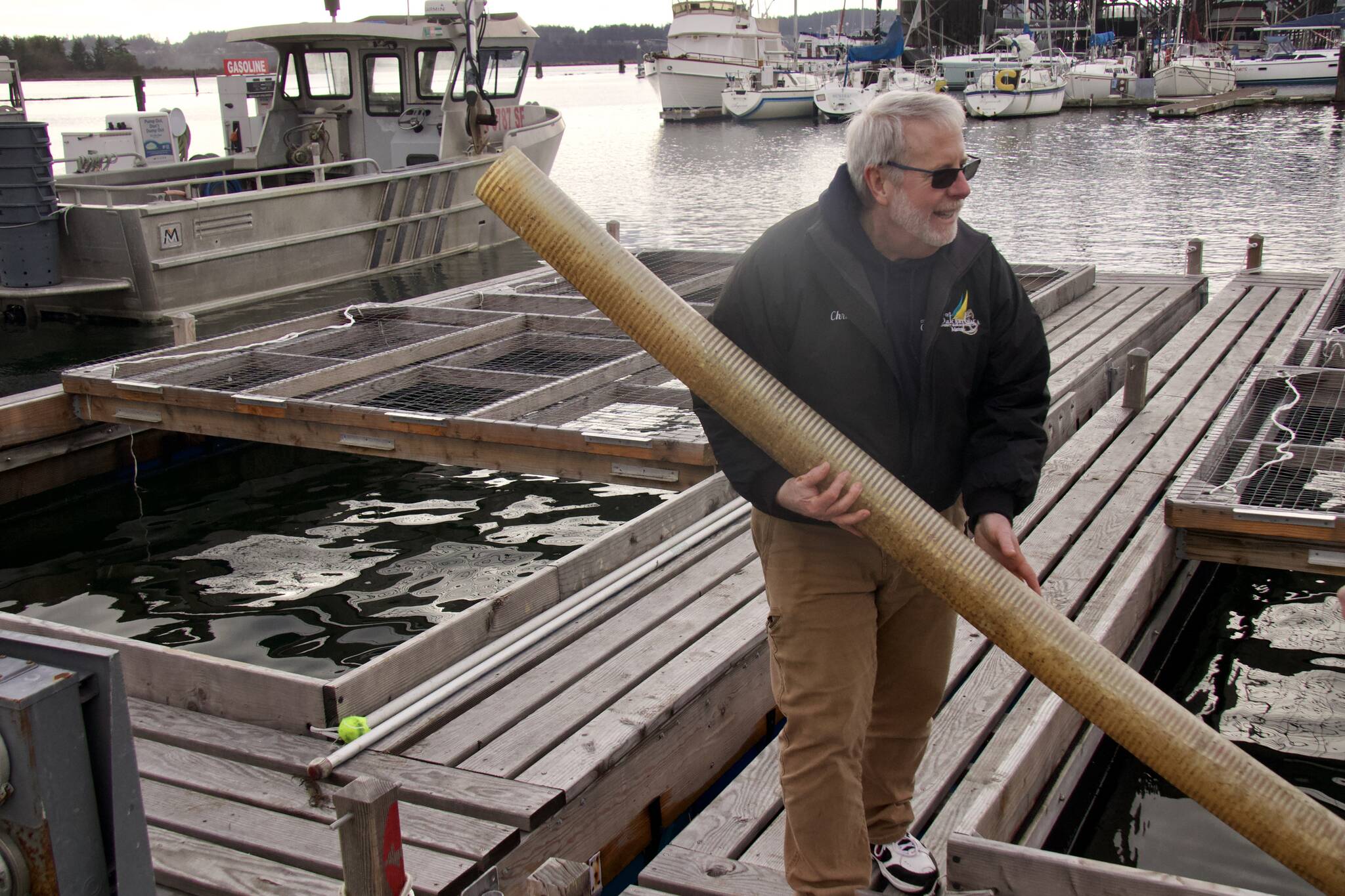 Harbor Master Chris Sublet sets up tubing.