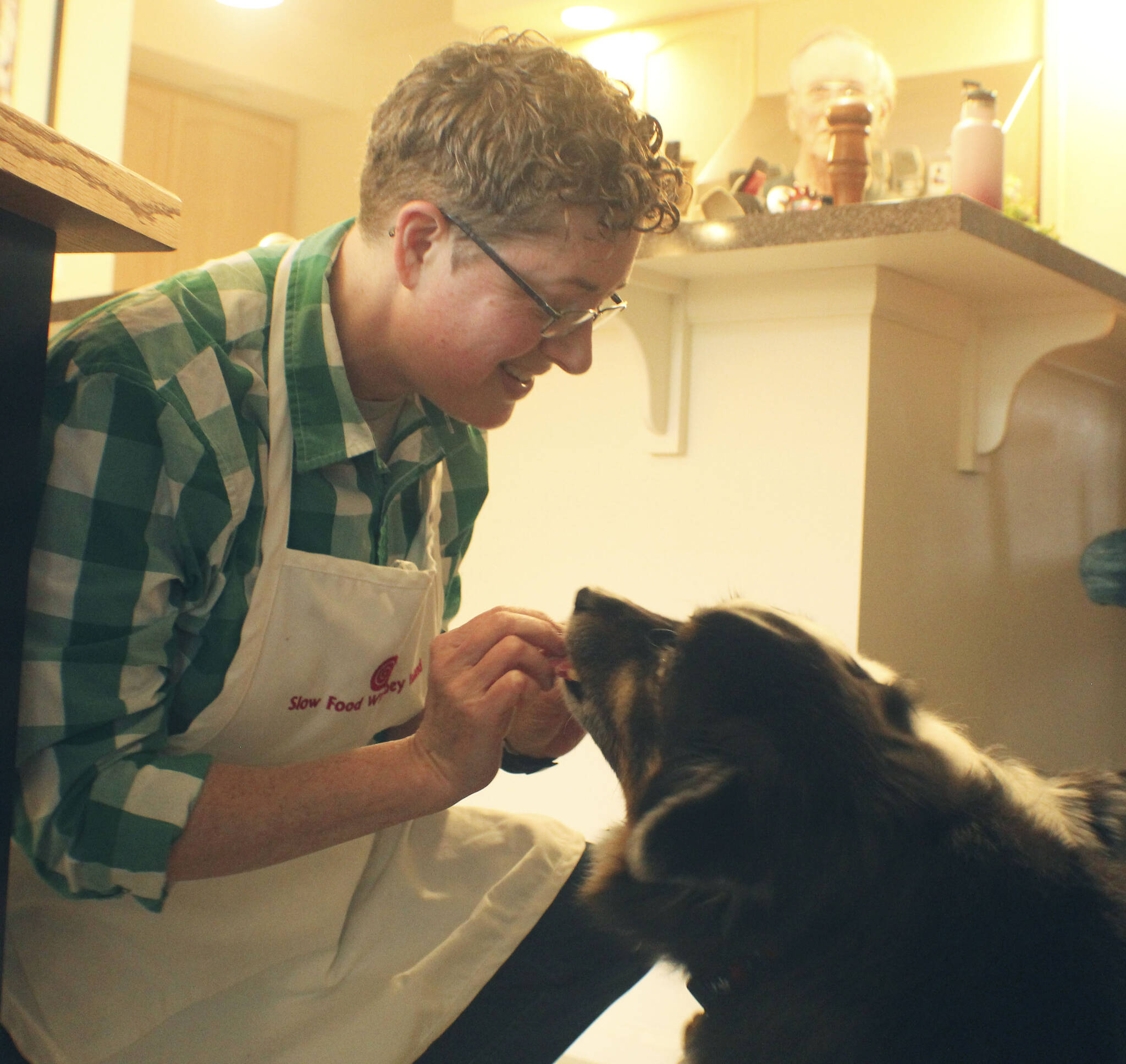 Photo by Karina Andrew/Whidbey News-Times
Arjai Allred runs their homemade dog treats by a couple expert taste testers.