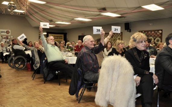 Photo provided
Attendees bid at a previous Coupeville Lions Club scholarship auction.