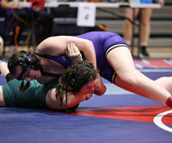 <p>Photo by John Fisken</p>
                                <p>Zoe Beeman pins an opponent at the sub-regional tournament Feb. 3. Beeman placed second in her weight class and qualified for the regional tournament Saturday.</p>
