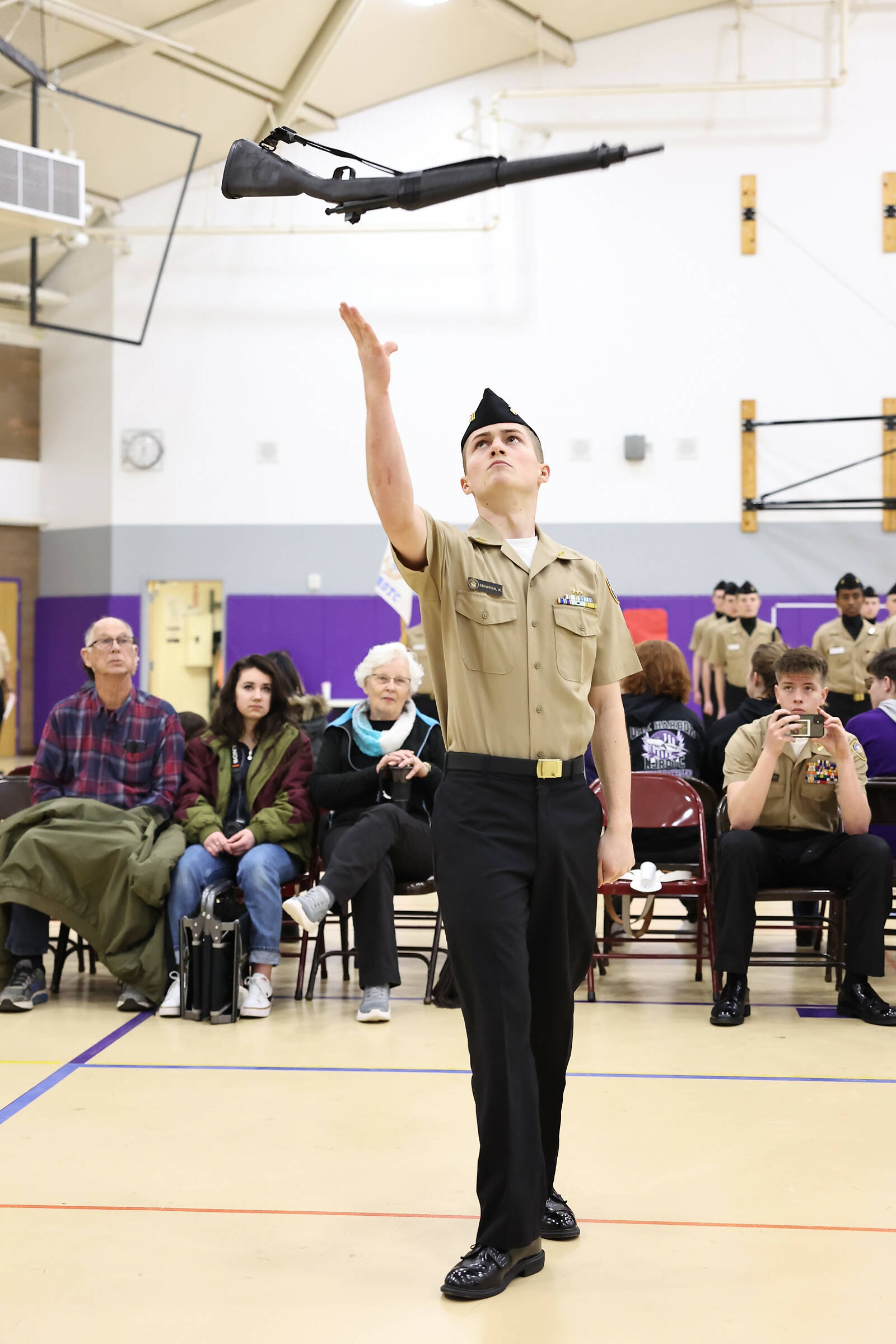 Photos by John Fisken
Oak Harbor student Raymond Shaffer won first place in the Individual Armed Exhibition Drill at the Northwest Drill and Rifle Conference at the Oak Harbor High School Feb 24. Oak Harbor High School’s NJROTC currently ranks the highest in its division, which consists of seven other high schools.