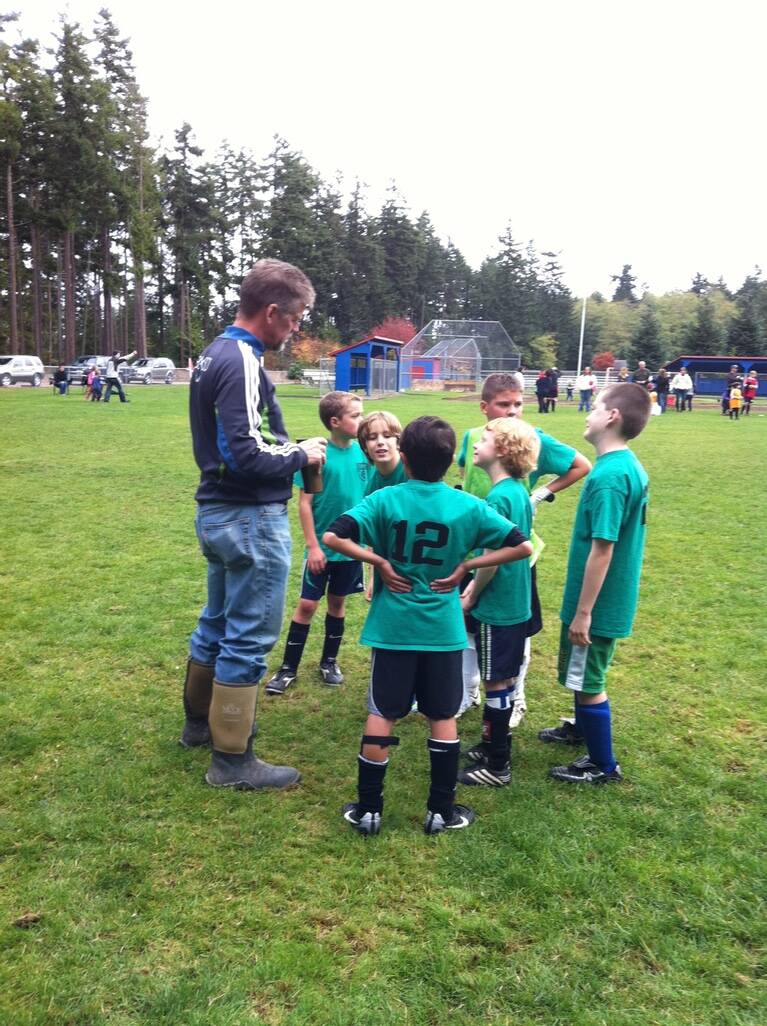 Photo provided
Mark Helpenstell coaches a youth soccer team circa 2011.