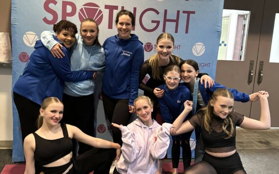 Island Dance Competition Team members celebrate their performances with a team photo. From left in front row are Emmalynn Rochholz, Maliya Thrasher and Clara Jacobson-Ross; back row shows Tay Pitts, Amelia Rochholz, Jamee Pitts (coach), Lindi Moore, Stella Jung and Lainey Dodge.