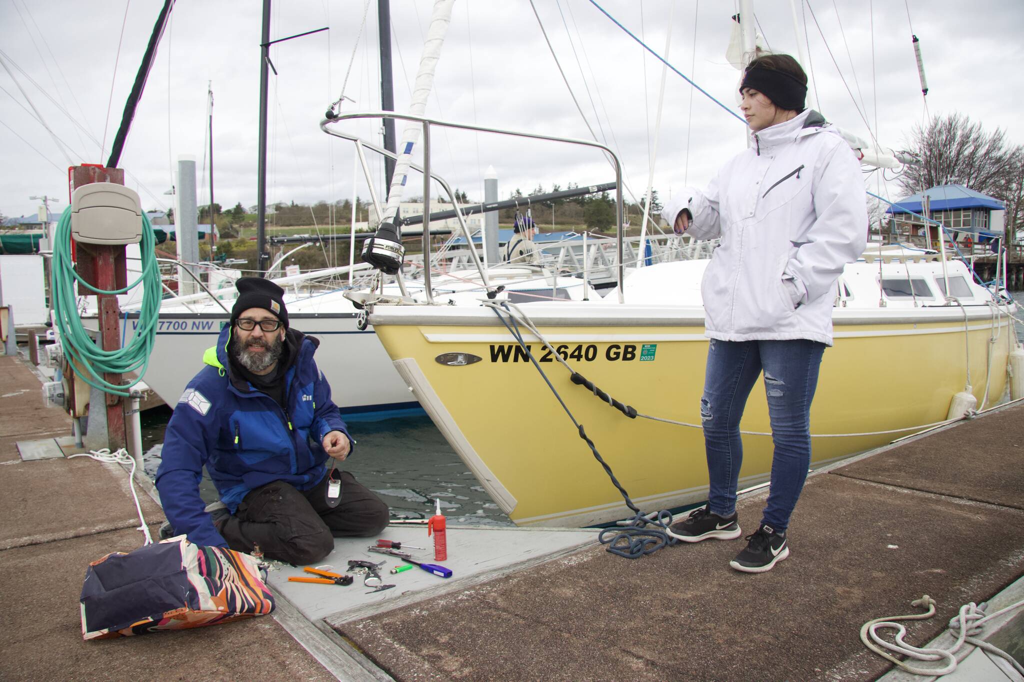 Brian Vick (left) and his daughter Raven sail their boat “Lemonade” in the Oak Harbor Yacht Club’s Frostbite Series. (Photo by Rachel Rosen/Whidbey News-Times)