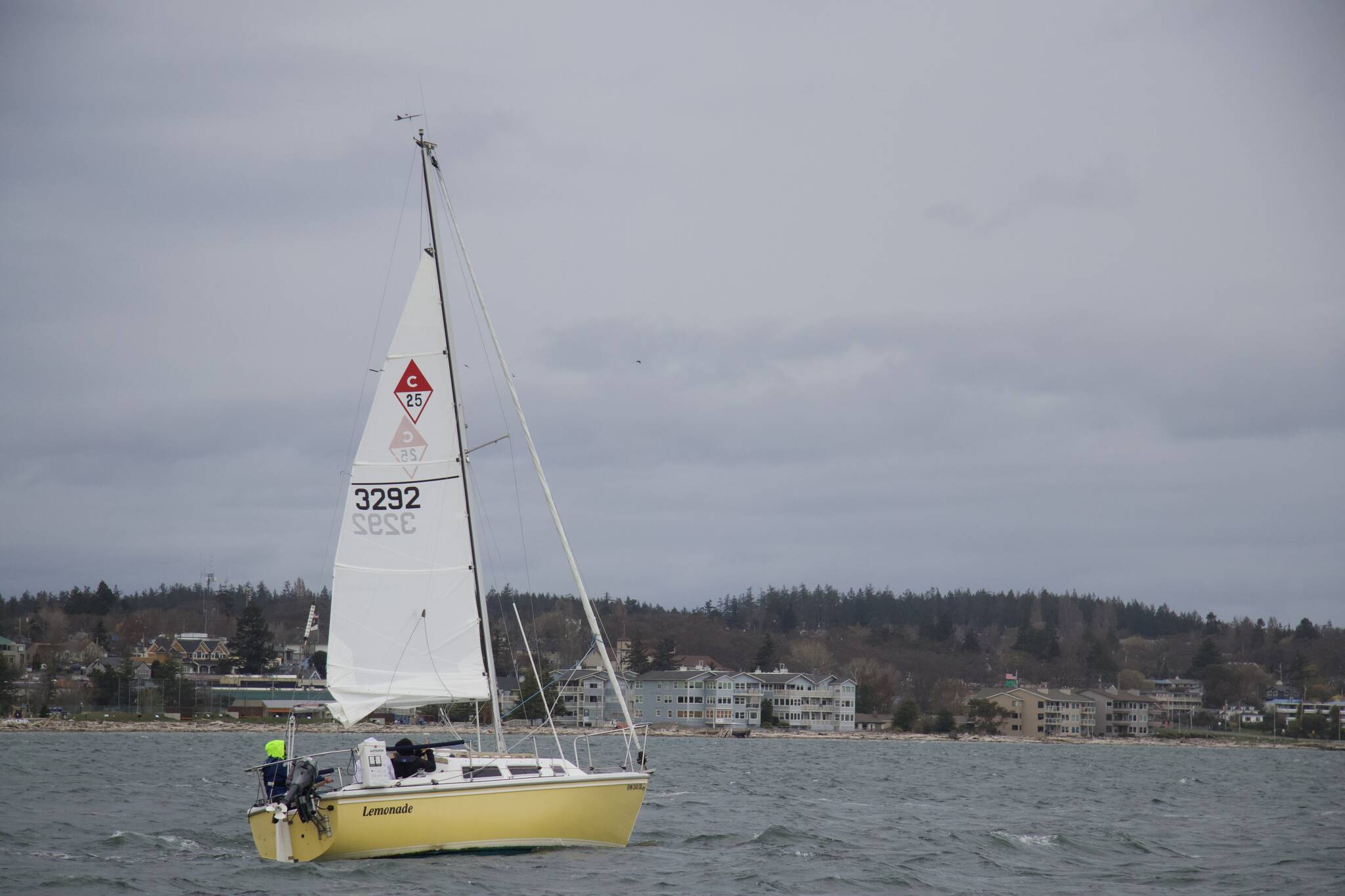 A San Jaun 24 sailboat named “Lemonade” before an Oak Harbor Yach Club race. (Photo by Rachel Rosen/Whidbey News-Times)