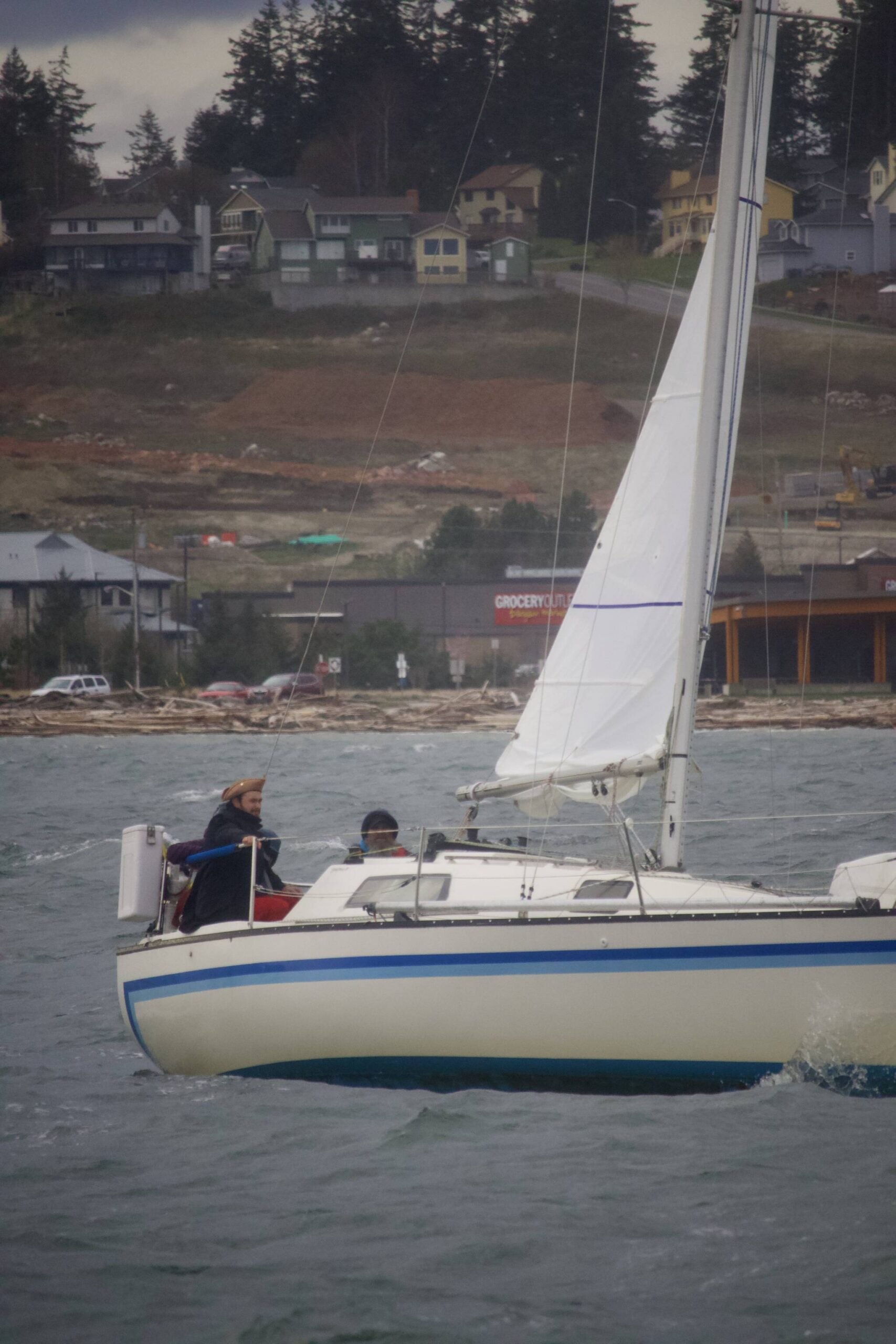 A boat participates in the Oak Harbor Yacht Club’s Frostbite Series sailboat race. (Photo by Rachel Rosen/Whidbey News-Times)