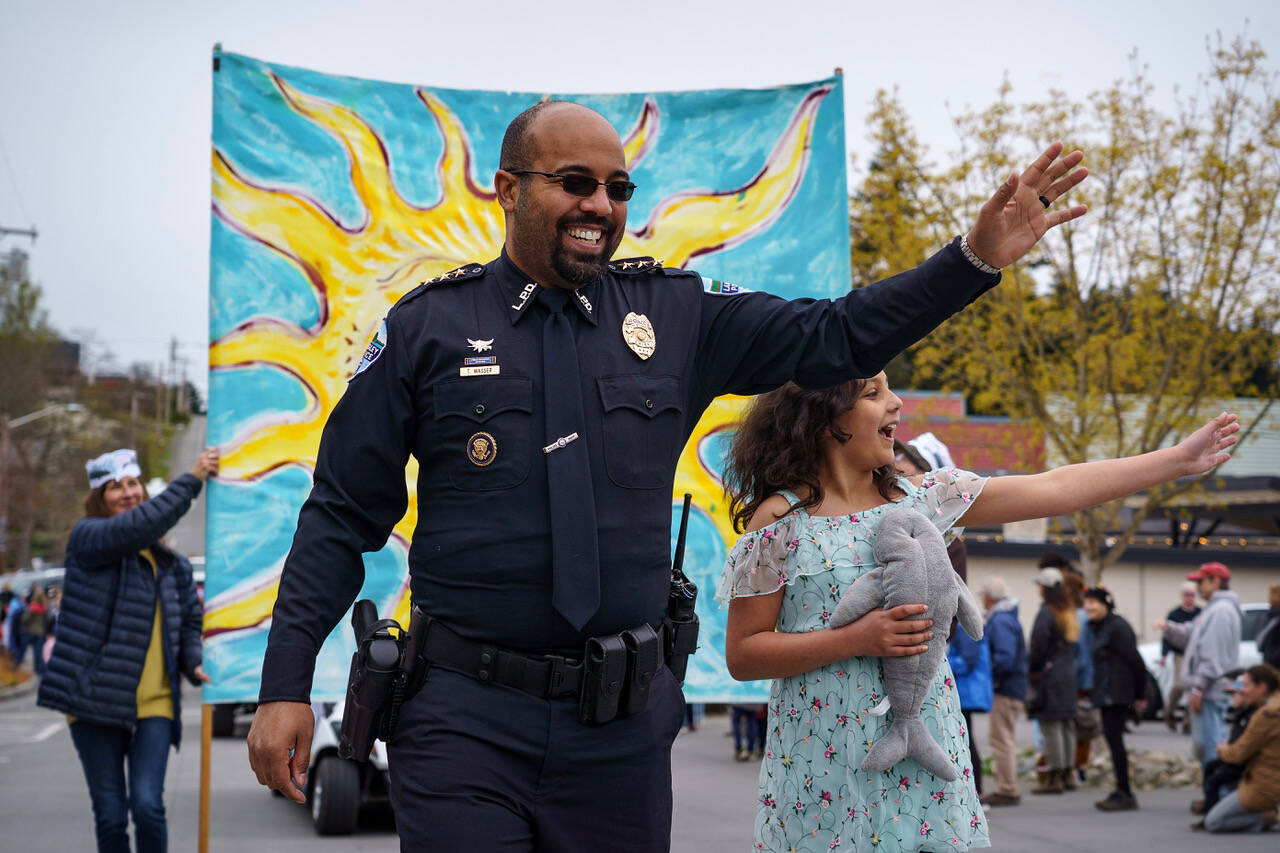 Photo by David Welton
Langley Police Chief Tavier Wasser and his 9-year-old daughter, Kira, led the parade on Saturday.