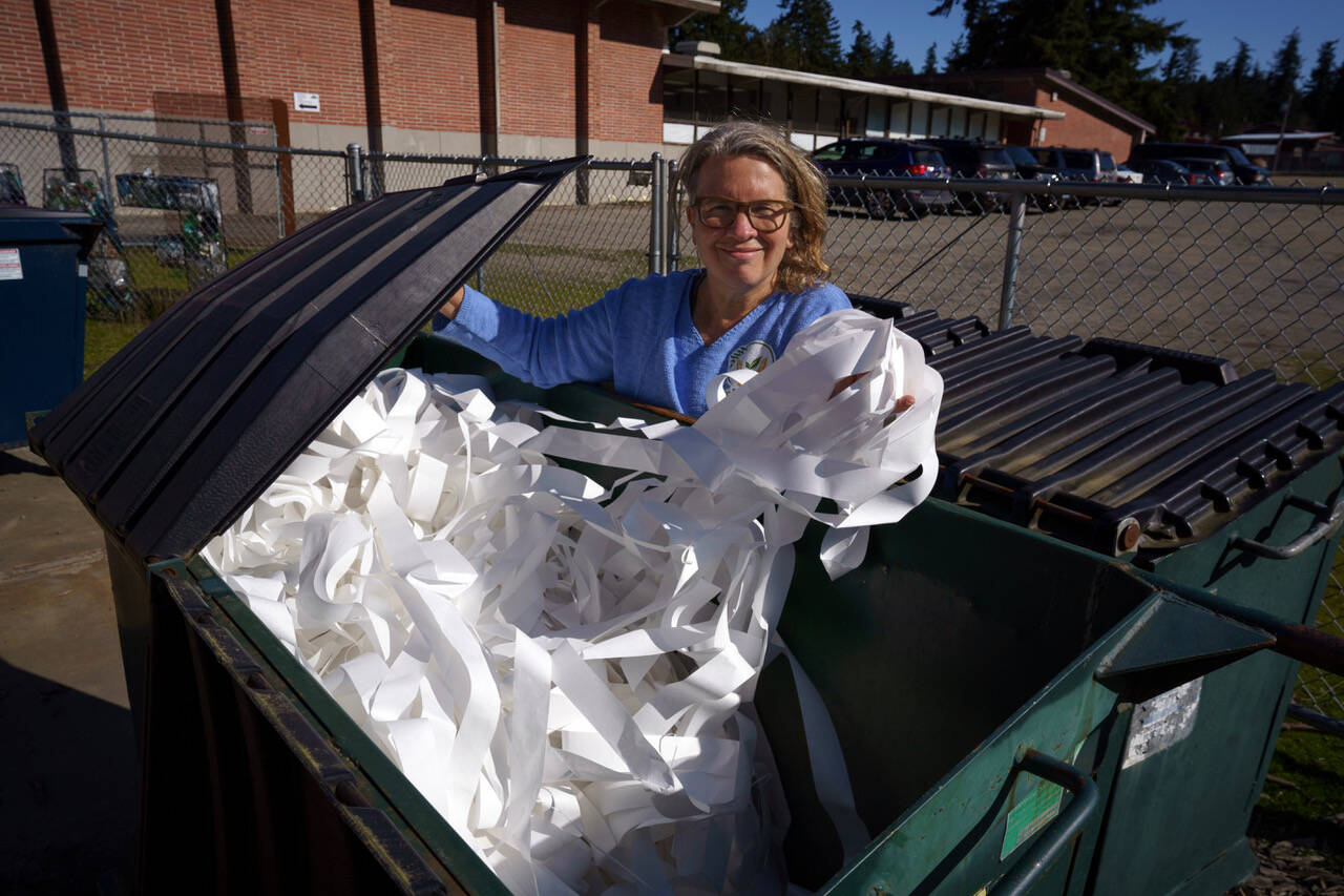 Joan Green, a member of rePurpose who also happens to be an artist that works with repurposed items, has been excited to find some of her materials in the dumpsters. (Photo by David Welton)