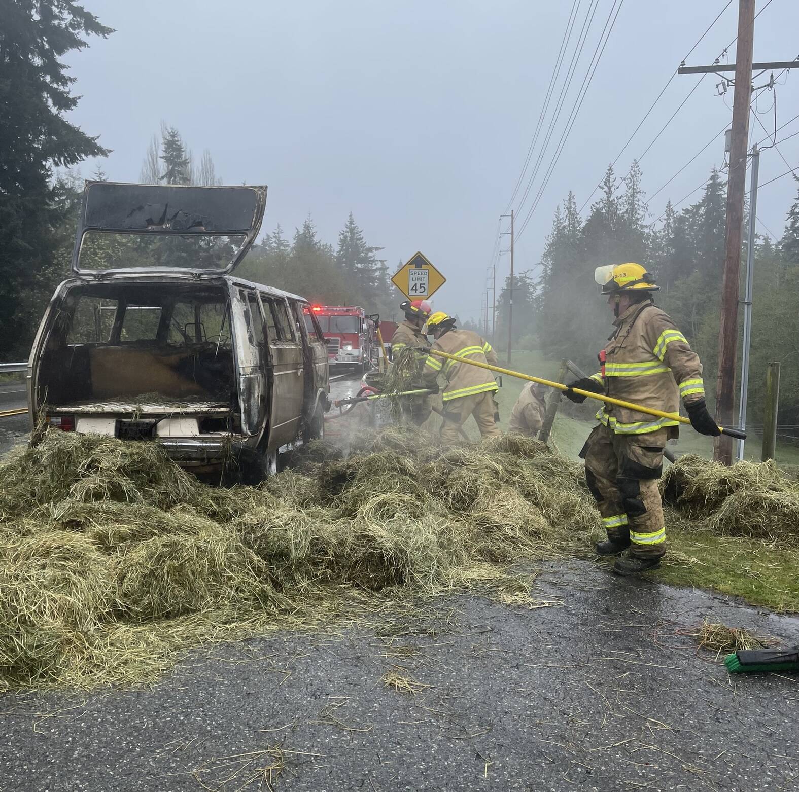 Photo provided by South Whidbey Fire/EMS
Firefighters had to remove all of the hay from the van in order to fully extinguish the vehicle fire.