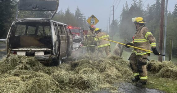 Photo provided by South Whidbey Fire/EMS
Firefighters had to remove all of the hay from the van in order to fully extinguish the vehicle fire.