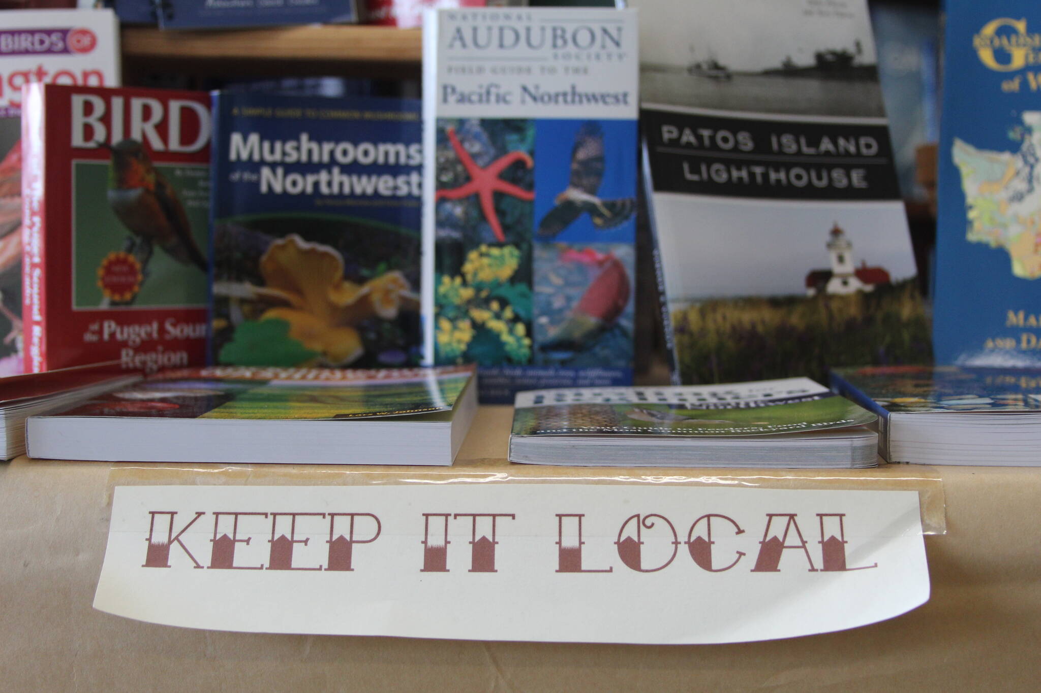 Photo by Karina Andrew/Whidbey News-Times
Wind and Tide Bookstore owner Karen Mueller has found her niche in the bookstore market by focusing part of her inventory on local guide and information books.