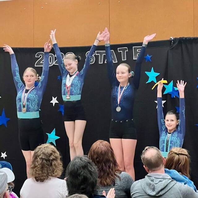 The Island Flyers took home several awards at last weekend’s state championships. From left, Sutton Zimmerman, Louri Sorensen, Katrin Kurganov and Gratia Riippa. (Photo provided)