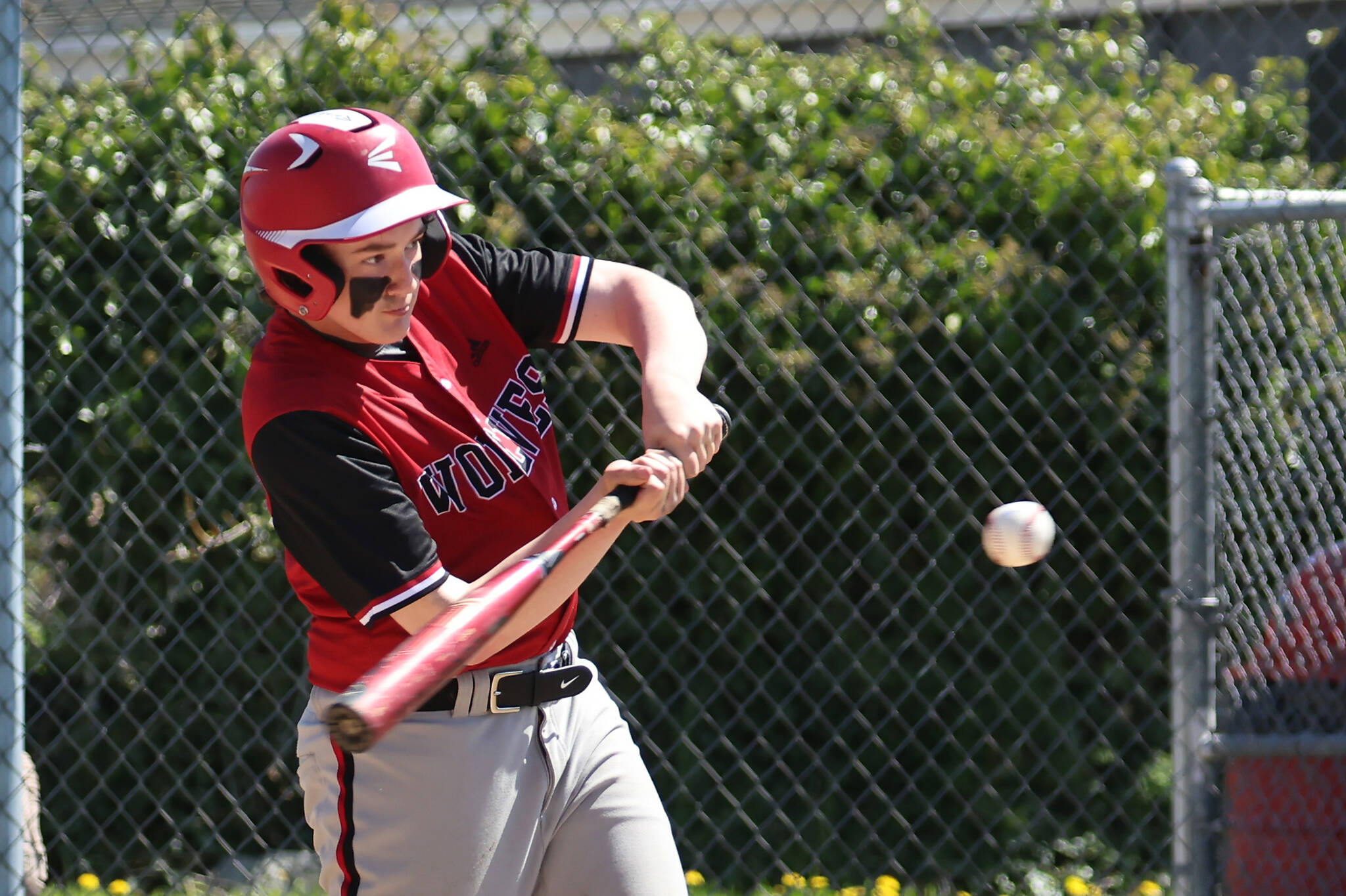 Photo by John Fisken
Coupeville High School freshman Coop Cooper hits in a game against La Conner April 29. The Wolves won 14-1.