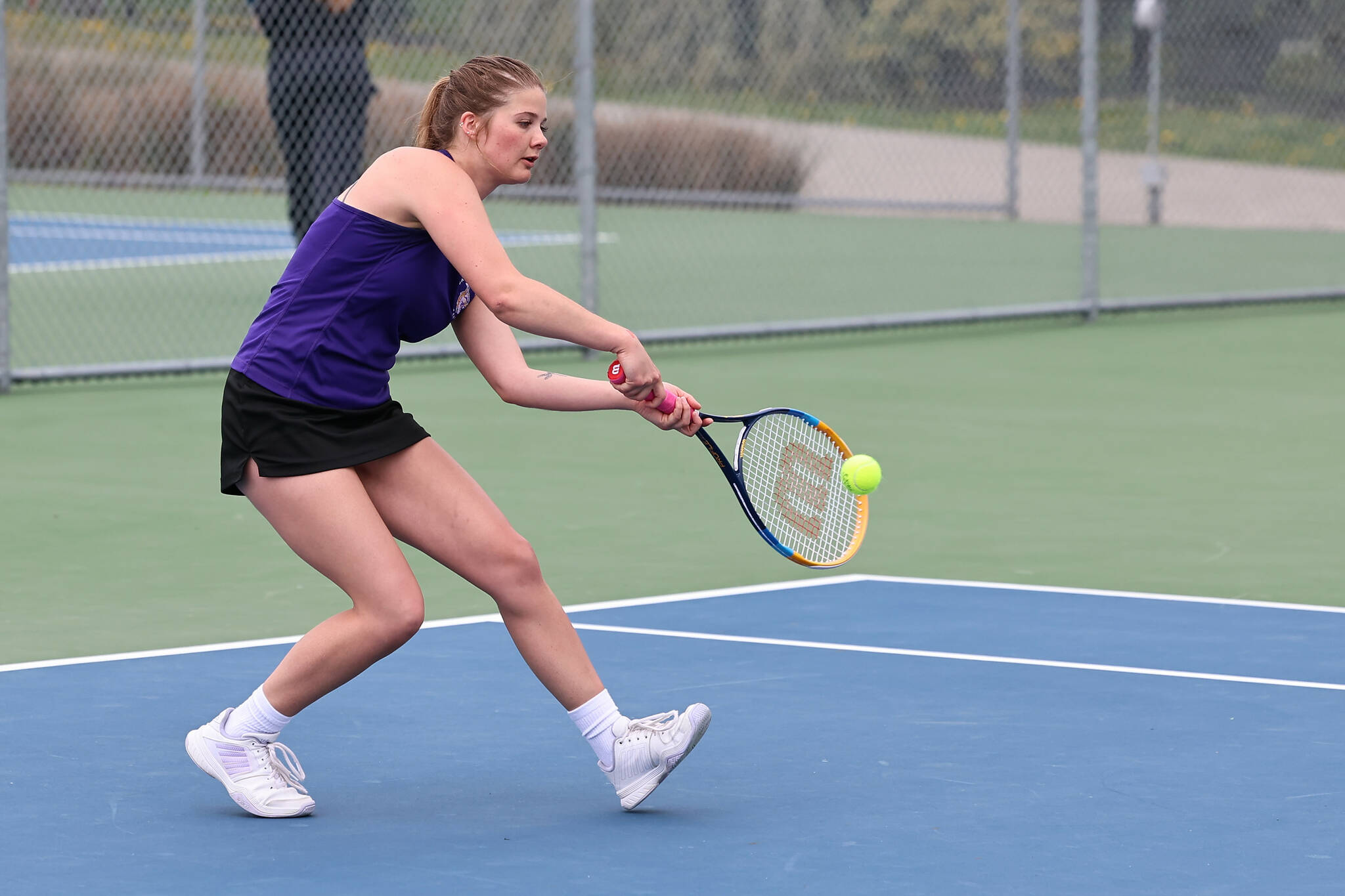 Oak Harbor athlete Jillian Knoll won second singles 6-3, 7-5 against Anacortes May 1. The Wildcats lost the match 3-4. (Photo by John Fisken)