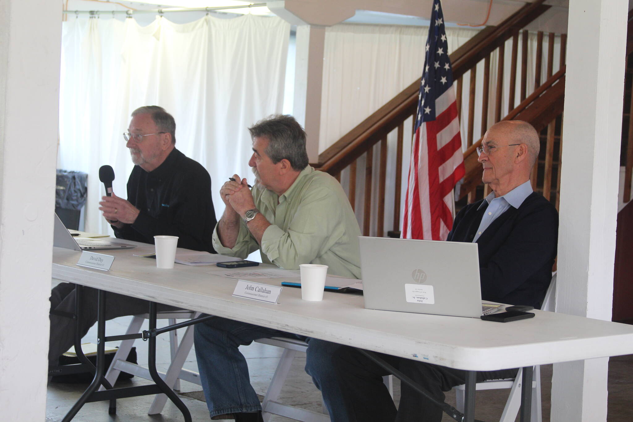From left, port commissioners John Mishasek, David Day and John Callahan host a public hearing regarding the port’s purchase of the A.J. Eisenberg Airport. (Photo by Karina Andrew/Whidbey News-Times)