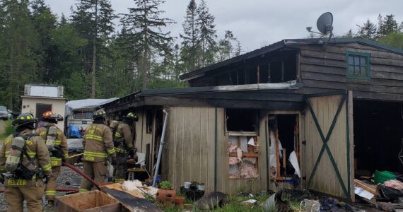 Photo provided
North Whidbey Fire and Rescue firefighters respond to a barn fire on Frostad Road on Sunday.