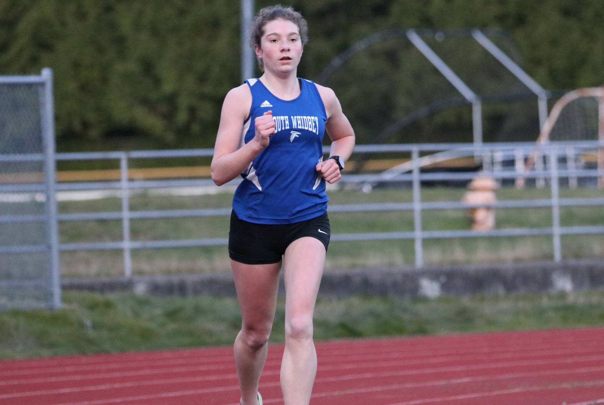 Photo by Matt Simms 
South Whidbey junior Naomi Atwood runs in a cross country race in 2021.