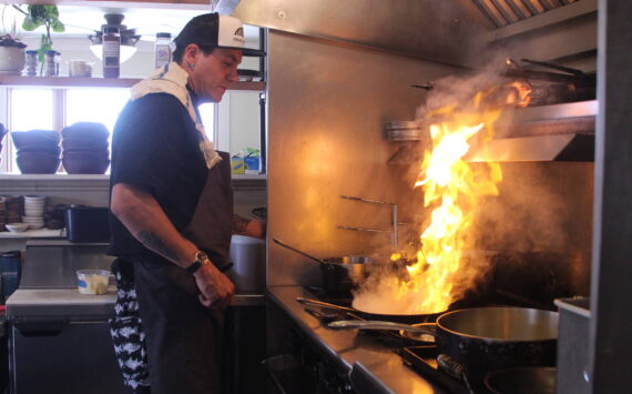 Photo by Karina Andrew/Whidbey News-Times
Ben Jones heats things up in the kitchen at Oystercatcher.