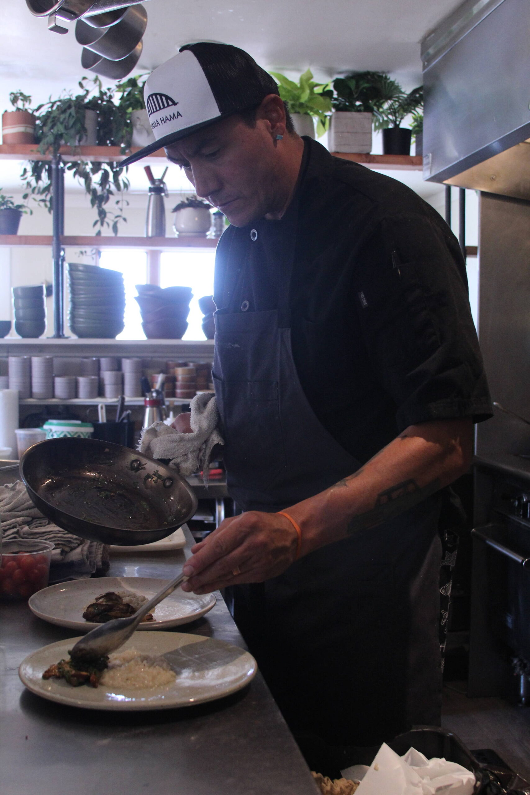 Photo by Karina Andrew/Whidbey News-Times
Ben Jones plates a meal at Oystercatcher.