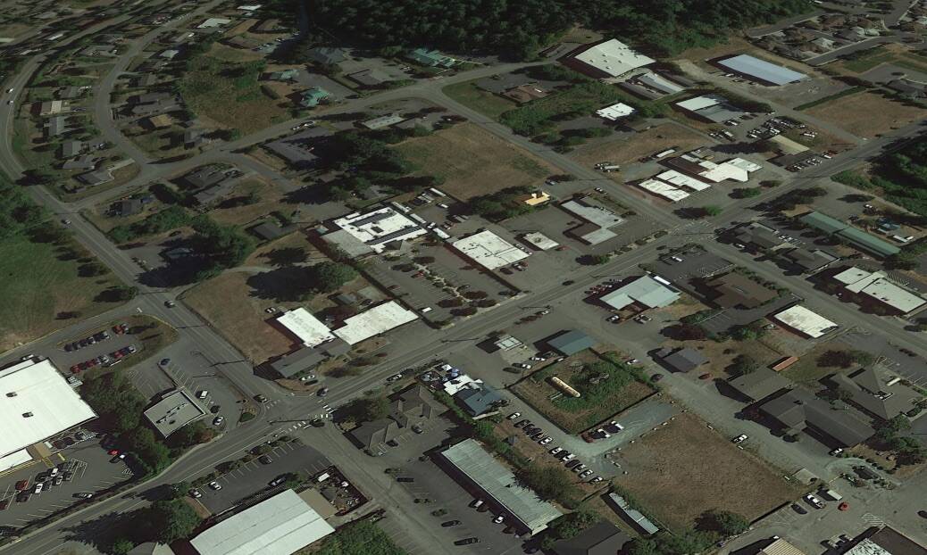 Three roundabouts had been planned for downtown Freeland. (Google Earth image)