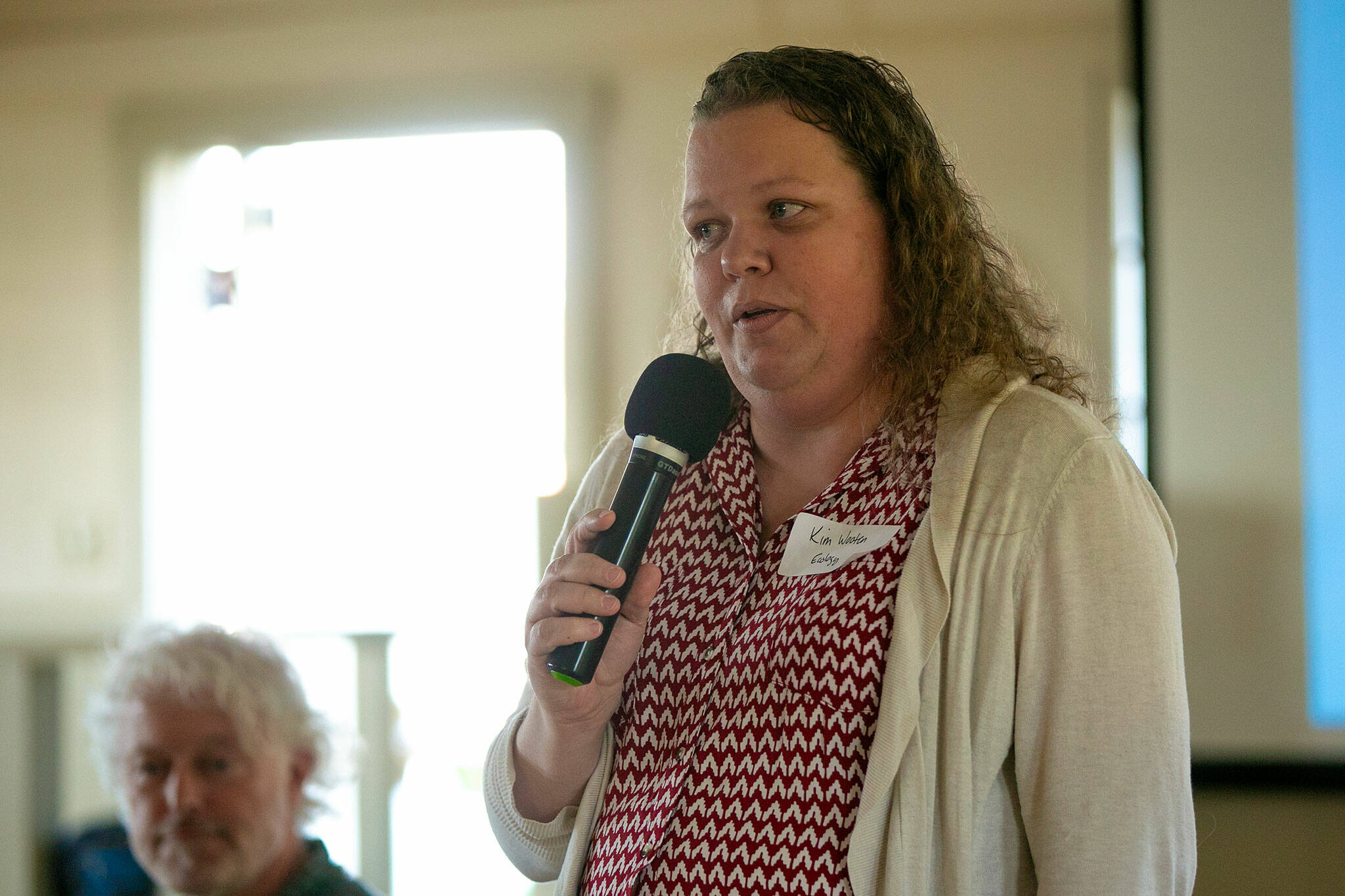 Kimberly Wooten, with the Washington Department of Ecology, responds to a question regarding PFAS found on Whidbey Island during a public forum at the Coupeville Recreation Hall on June 22, 2023, in Coupeville, Washington. (Ryan Berry / The Herald)