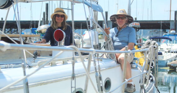 Photo by Karina Andrew/Whidbey News-Times
From left, Jackie and Jeffrey Baraban enjoy a sunny day on their boat at the Oak Harbor Marina. The Barabans are among those marina patrons who would consider relocating if moorage rates spike too high.
