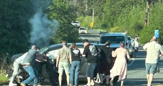 Photo provided
Bystanders saved a man from a car after a crash.