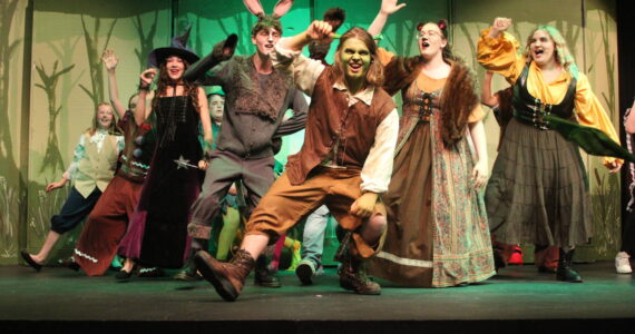 Photo by Karina Andrew/Whidbey News-Times
Graham Ray, center, stars as the titular character in "Shrek the Musical" at the Whidbey Playhouse. In this scene, Shrek and a host of exiled fairytale creatures rally in preparation to fight back against the evil Lord Farquaad and declare they accept themselves and one another as they are.