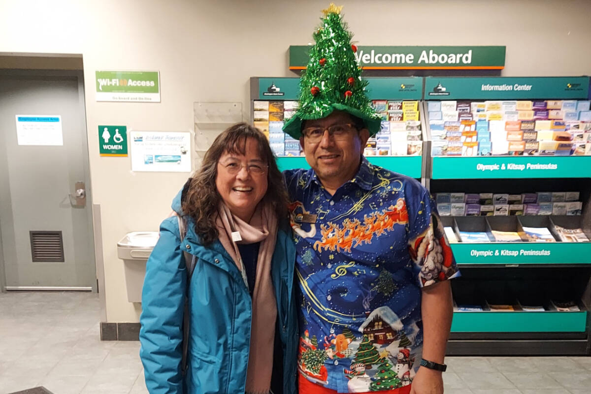 Island Transit rider Gayle, with bus driver Tino. Gayle appreciates the cleanliness of Island Transit buses along with the friendly atmosphere among fellow riders. Island Transit photo