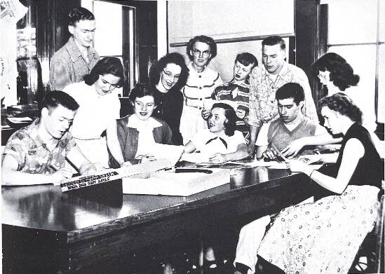 The yearbook staff of Oak Harbor High School work on the 1953 edition of The Acorn. (Photo provided)