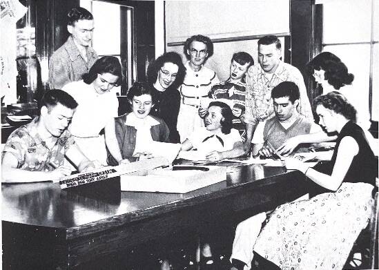 The yearbook staff of Oak Harbor High School work on the 1953 edition of “The Acorn.” (Photo provided)