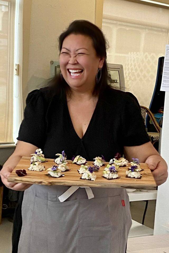 Joan Samson with a tray of Bouquerones sushi bites. (Photo provided)