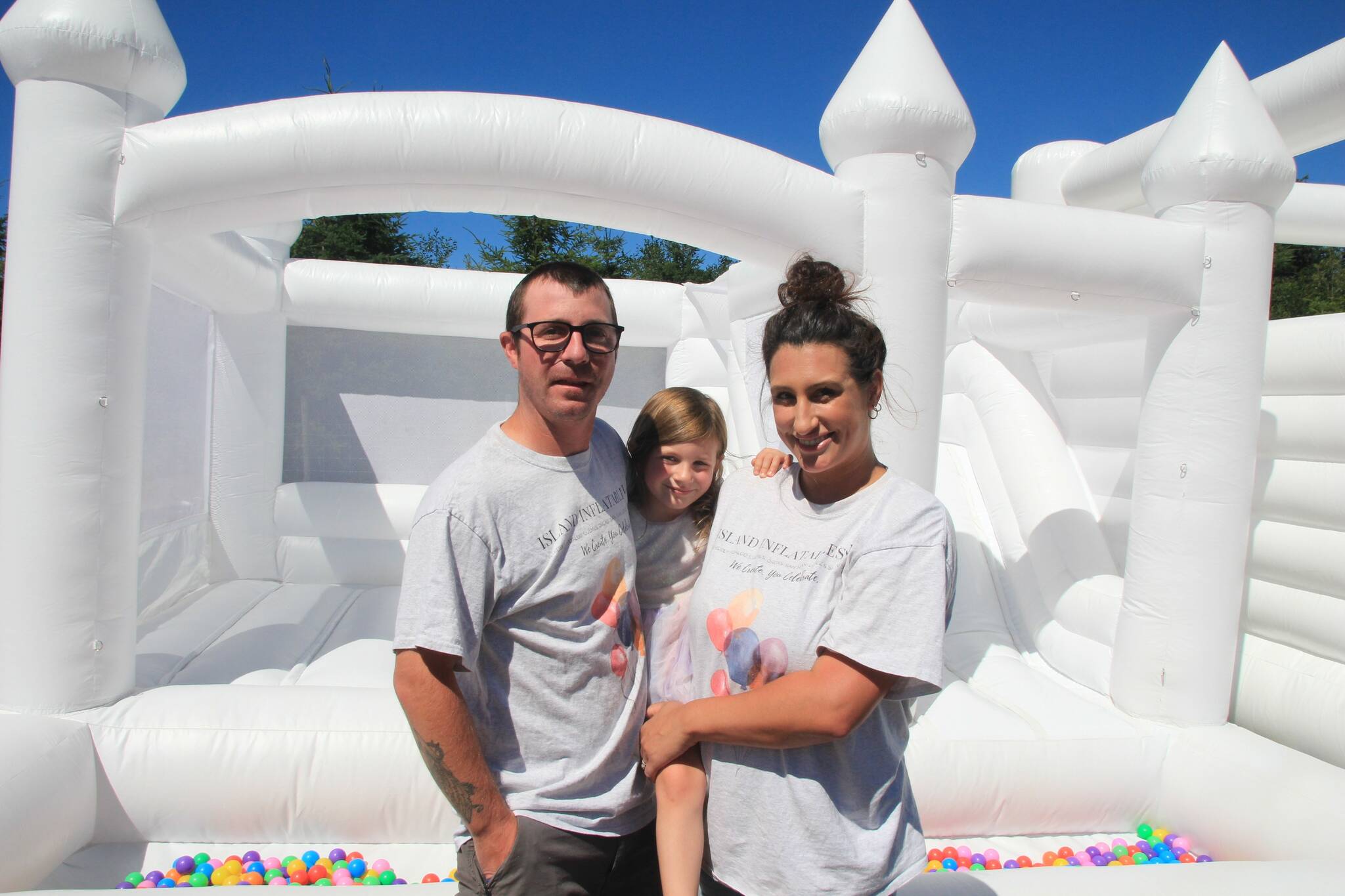Marri Metz poses with her husband Tyson and their daughter Teagan. (Photo by Luisa Loi/Whidbey News-Times)