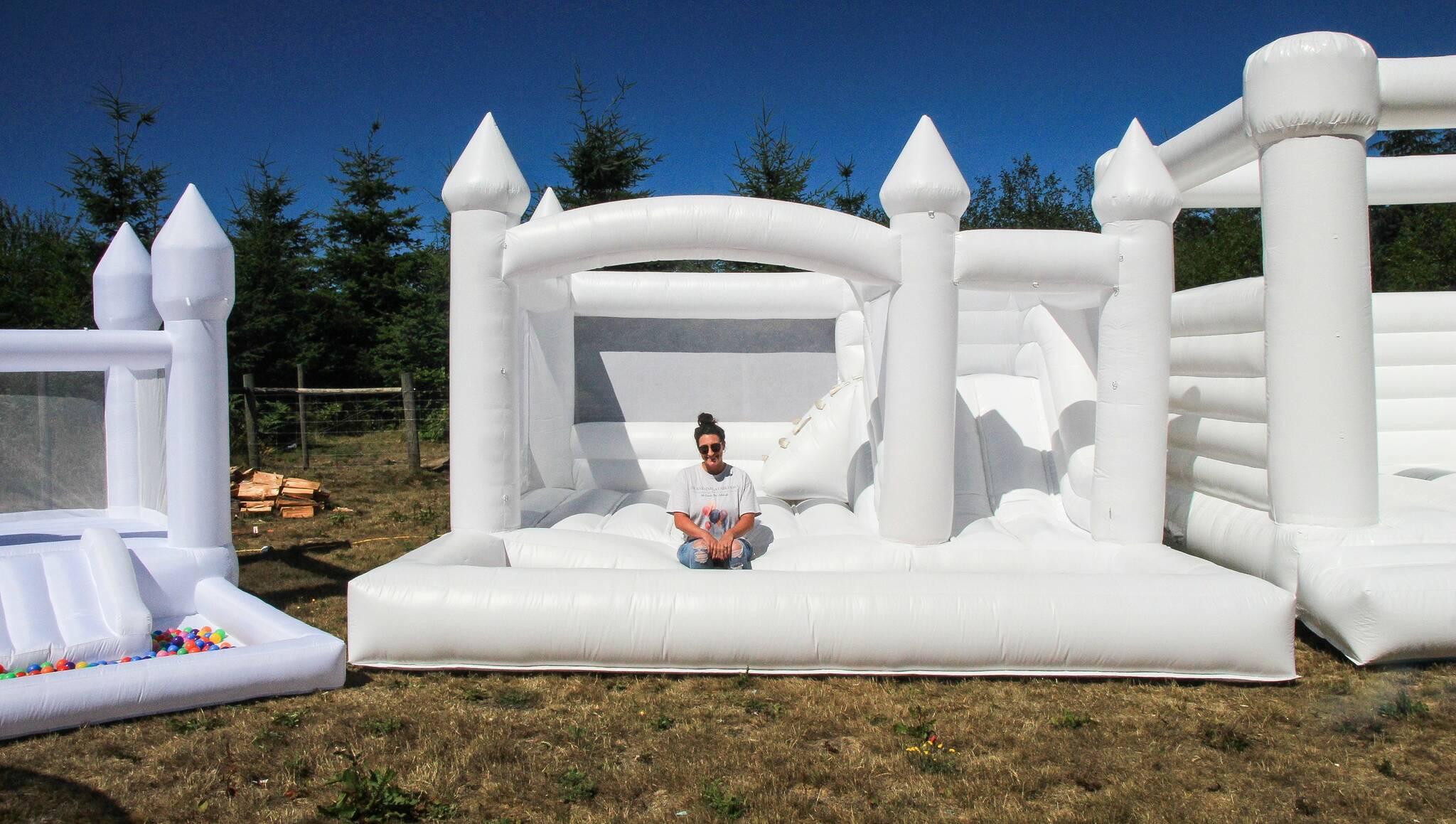 Photo by Luisa Loi/Whidbey News-Times
Marri Metz sits on the Great White, surrounded by her collection of inflatables.
