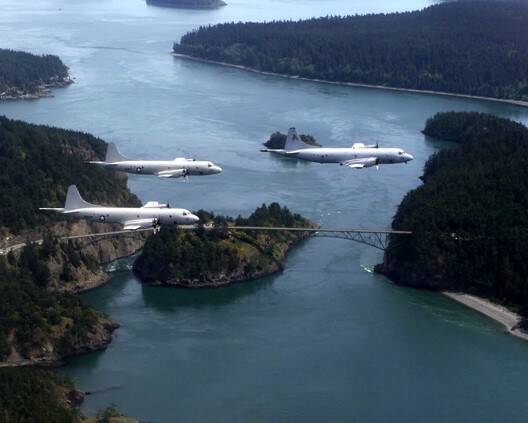 P-3s fly over Deception Pass.