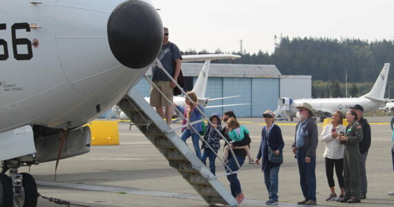 File photo by Karina Andrew/Whidbey News-Times
Guests wait in line to tour a Navy aircraft at the NAS Whidbey Island base open house in 2022.