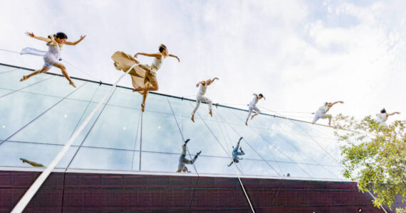BANDALOOP leaps across this new building, showcasing their otherworldly talent. Photo courtesy of Keith Ross.