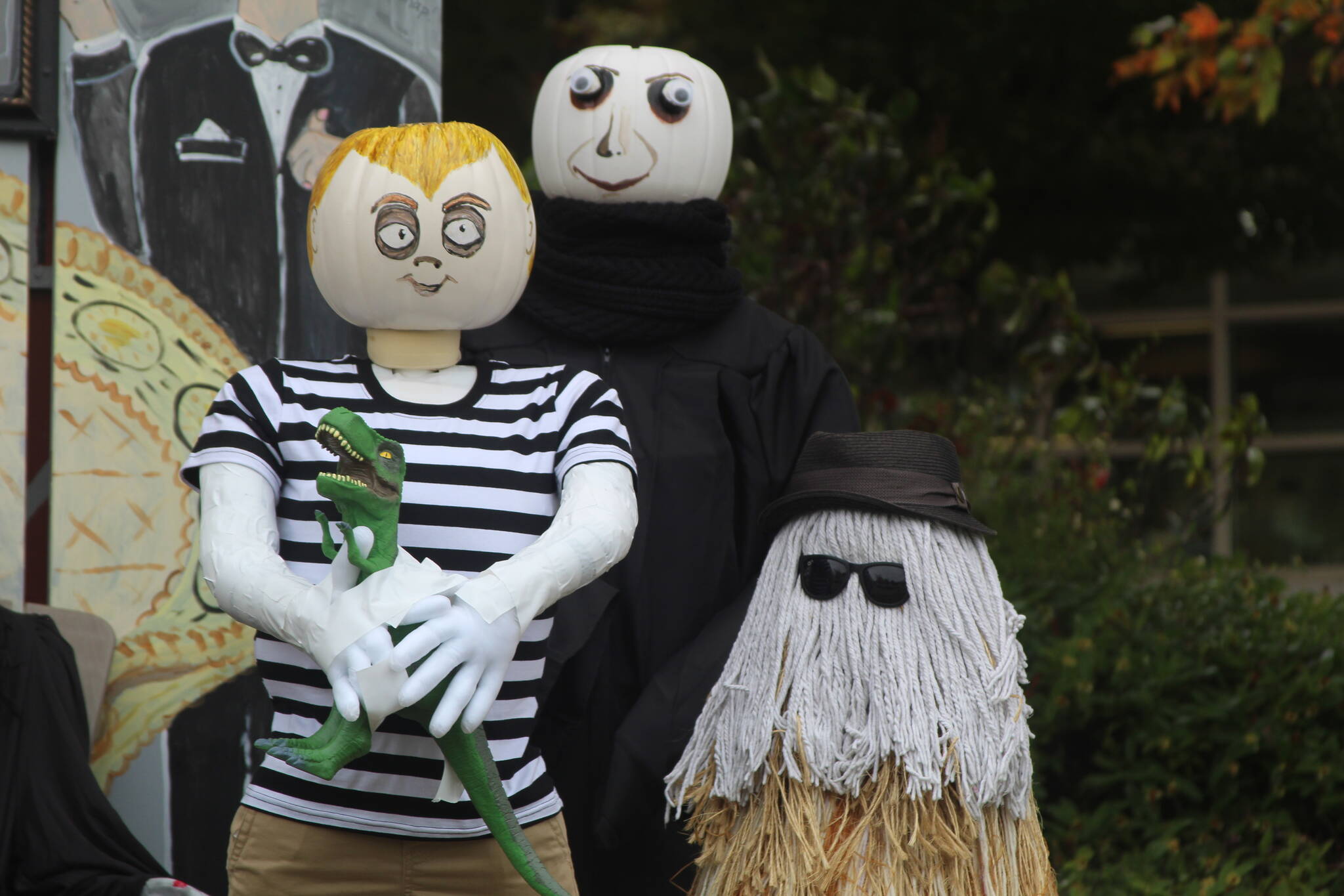 The Coupeville Lions Club put up a scarecrow display near the corner of Main Street and Highway 20. (Photo by Karina Andrew/Whidbey News-Times)