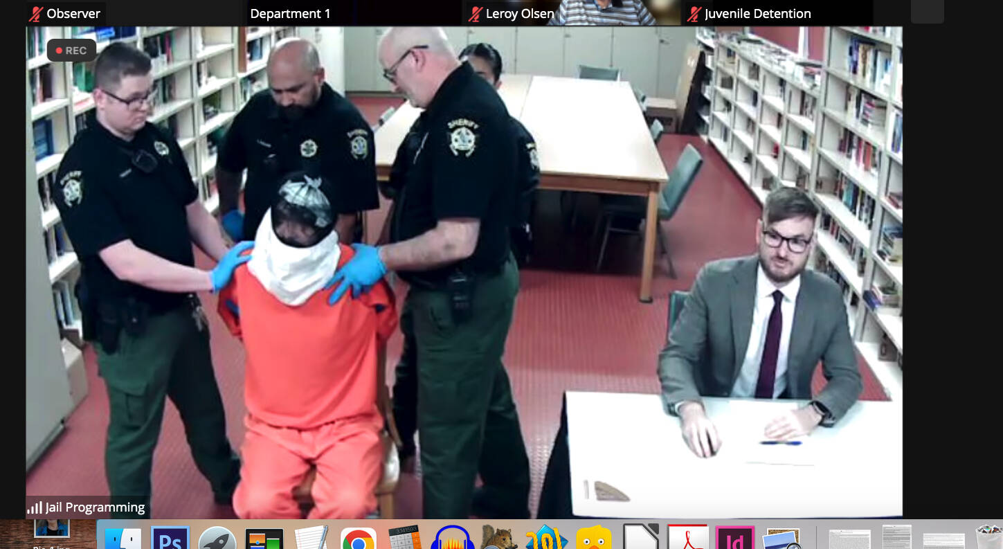 Richard Martin became unruly and had to be retrained while appearing in court by video from the jail.