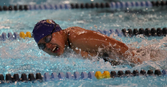 Photo by John Fisken
Lola Chargualaf swims at a meet earlier this year.