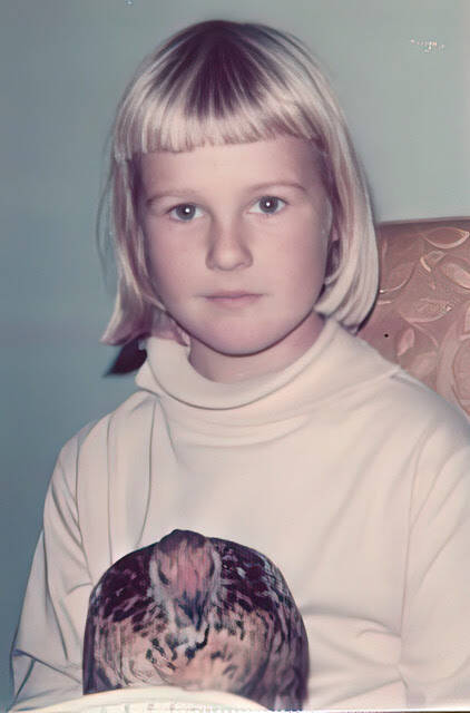 A young Maria Converse with a pet chicken. (Photo provided)