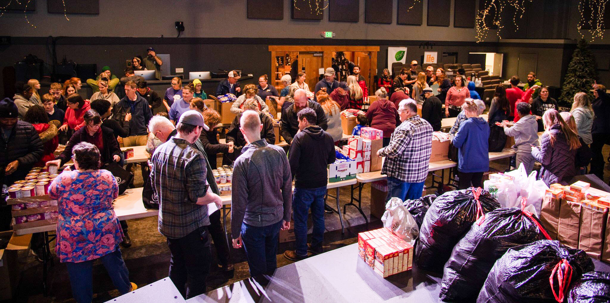 Life Church volunteers assemble meals that will be distributed to low-income families on Dec. 17. (Photo provided)