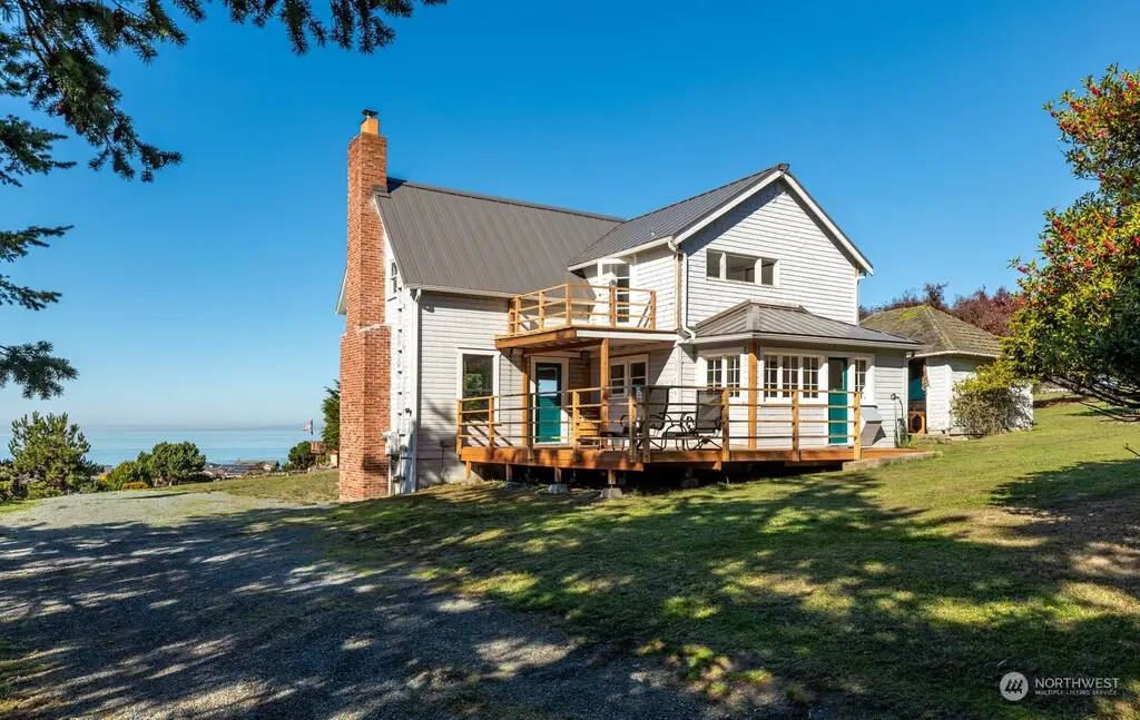 Ian Olsen presented this image of the Samuel Libbey House to the Preservation Commission. It shows the historic house after a new roof and deck.