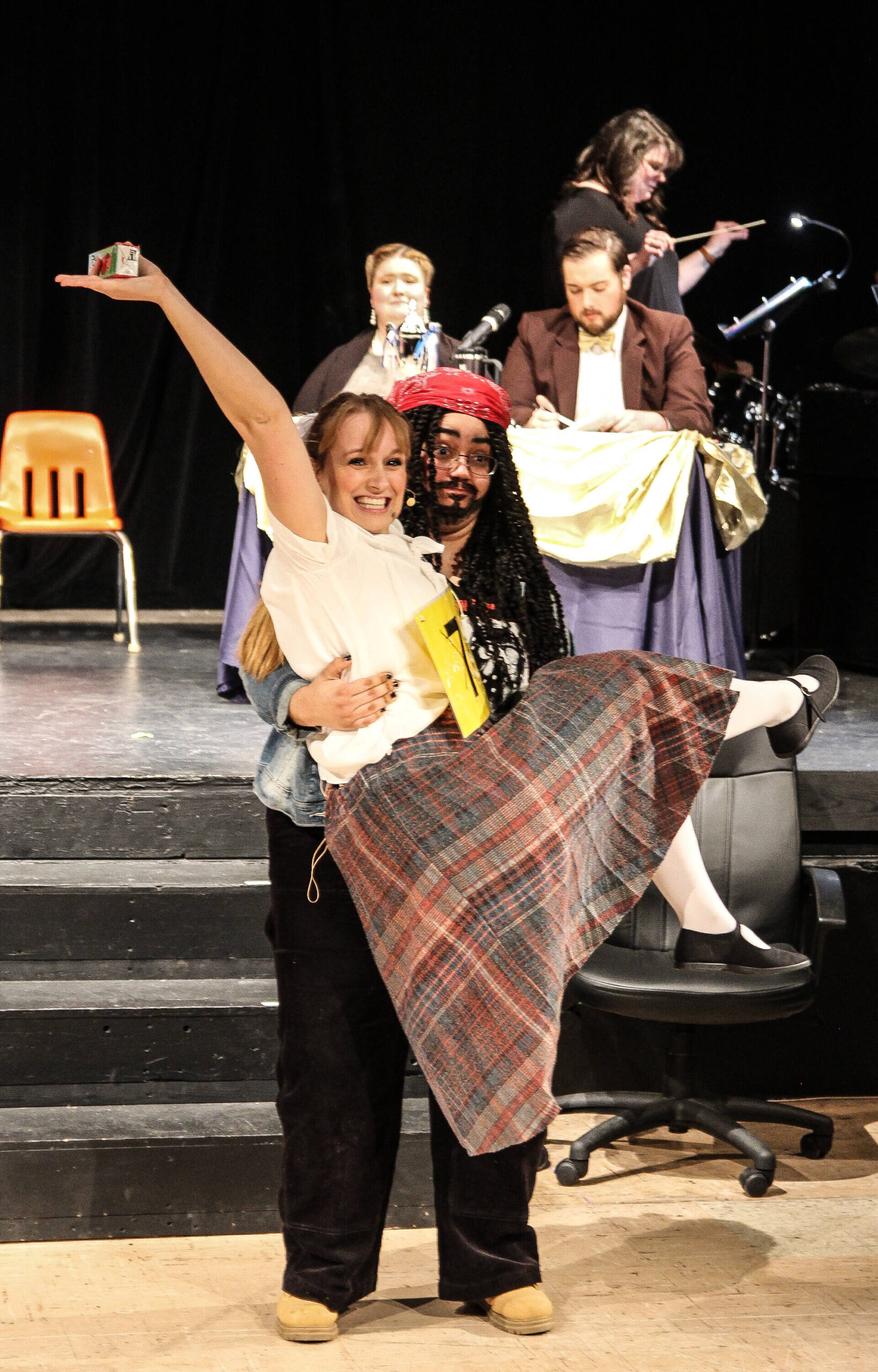 Mitch Mahoney (Grace Jones) holds Marcy Park (Karina Andrew) in a scene of the show. (Photo by Luisa Loi)