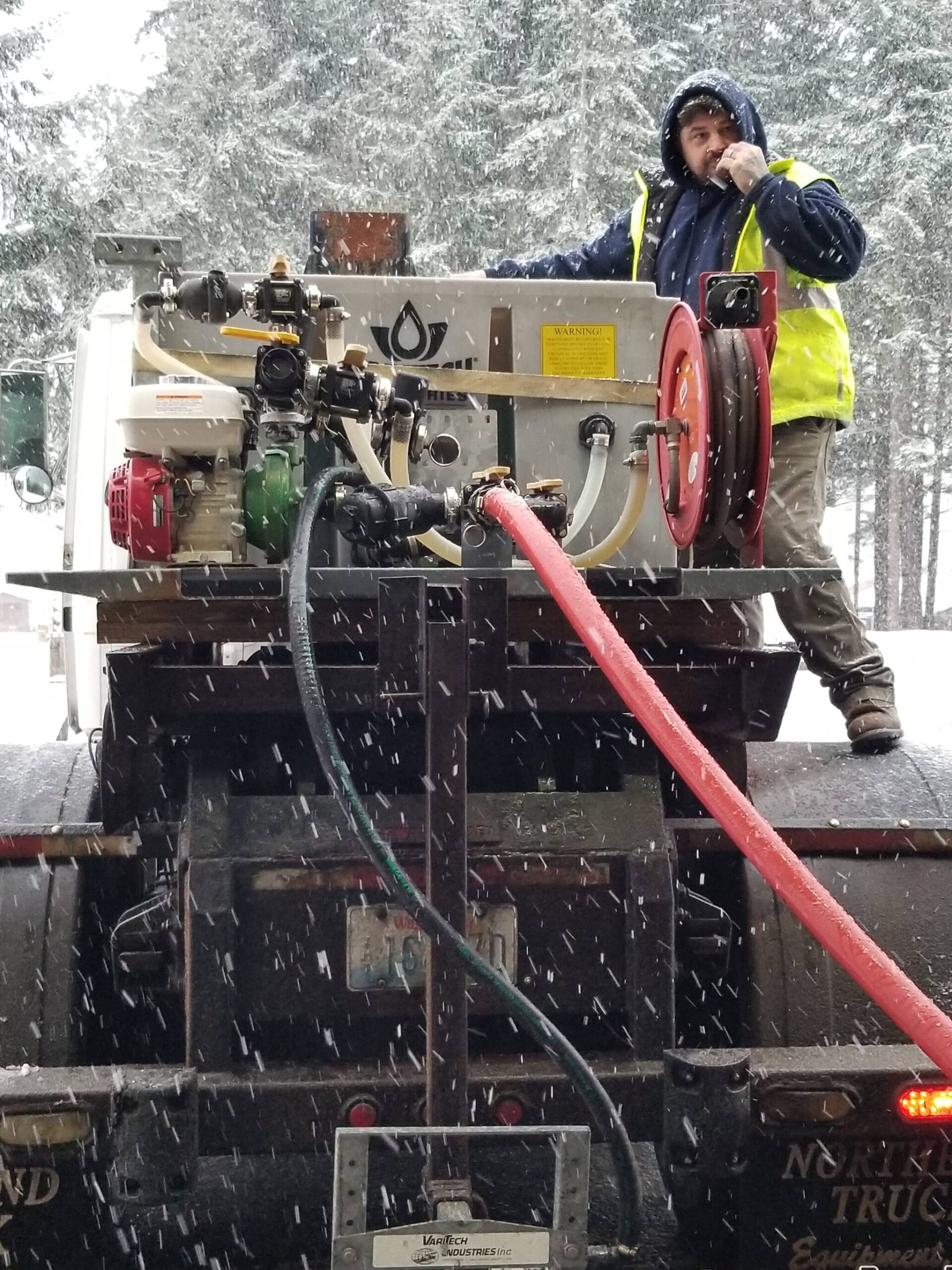 On January 18, 2024, Public Works Department staff Jeremy Freer prepares salt water brine for anti-icing of the City’s roads and for use on the Navy base. (Photo courtesy of City of Oak Harbor Public Works)