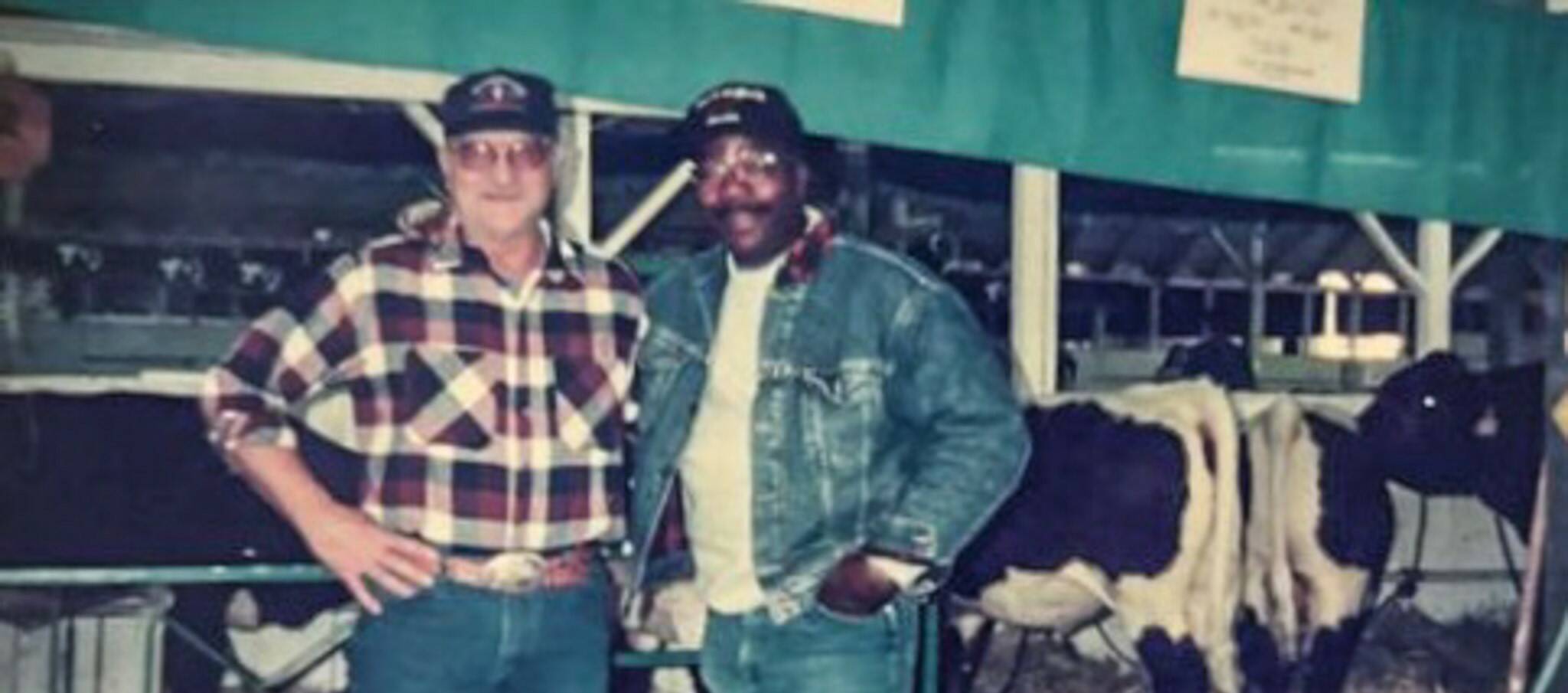 Eastern Washington cattle breeder Duane Mickelsen (left) and actor Carl Weathers (right) showing cattle at the Yakima County Fairgrounds. (Photo courtesty of Duane Mickelsen)