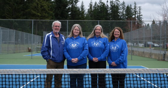 South Whidbey’s girls tennis coaches will retire at the end of the season. From left is volunteer Tom Kramer, who coached from 1978-2012, current coach Karyle Kramer and assistant coaches Bess Windecker-Nelson and Jenny Gochanour. Photo by Nathan Whalen.