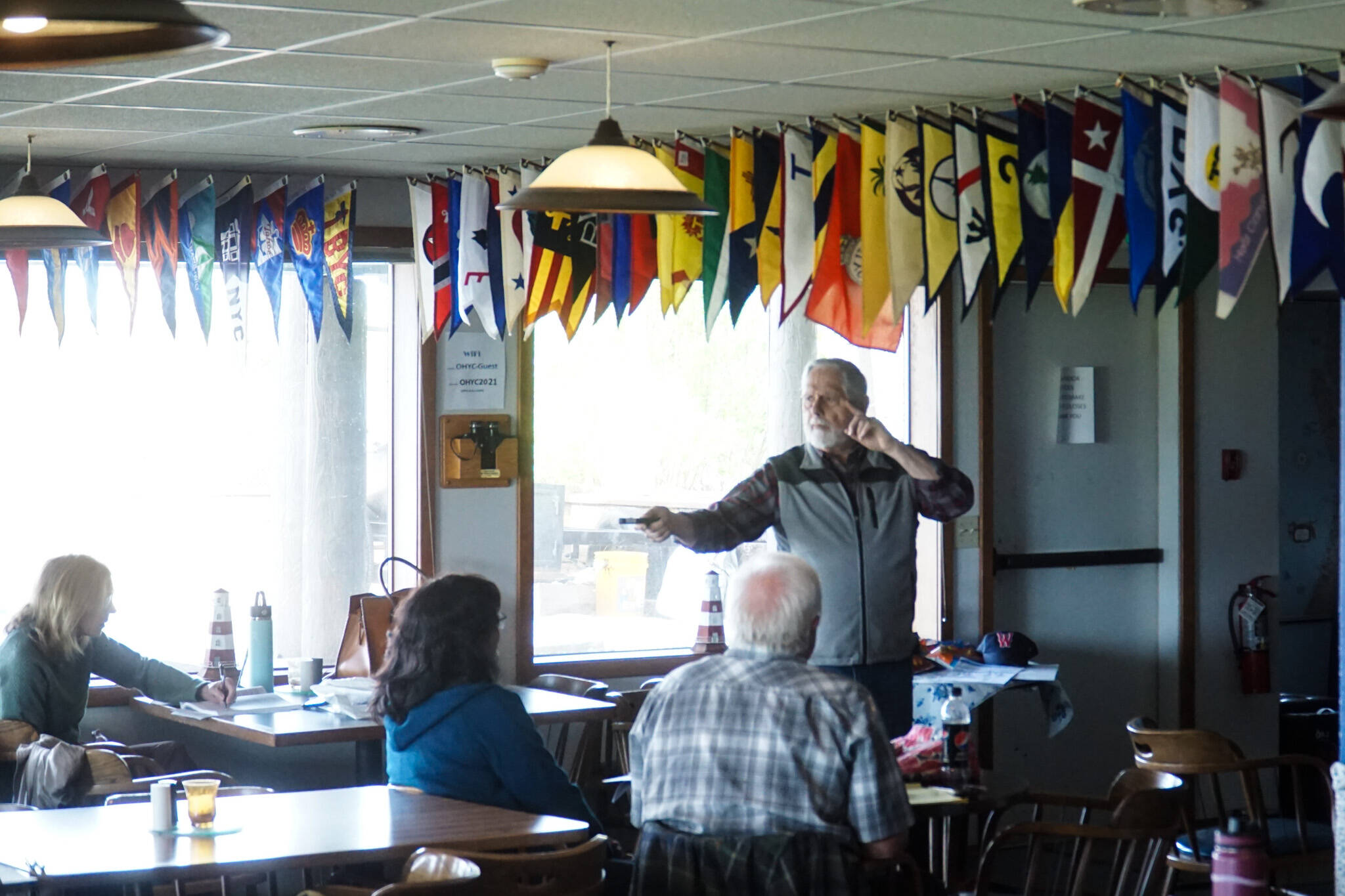 Retired Coastguardsman Jim Cushman leads a presentation on boat safety on Saturday at the Oak Harbor Yacht Club. (Photo by Sam Fletcher)