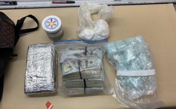 Oak Harbor police photo
plastic bags of suspected cocaine, a foil-covered brick of suspected cocaine, $79,000 in cash and large number blue "M30" pills.